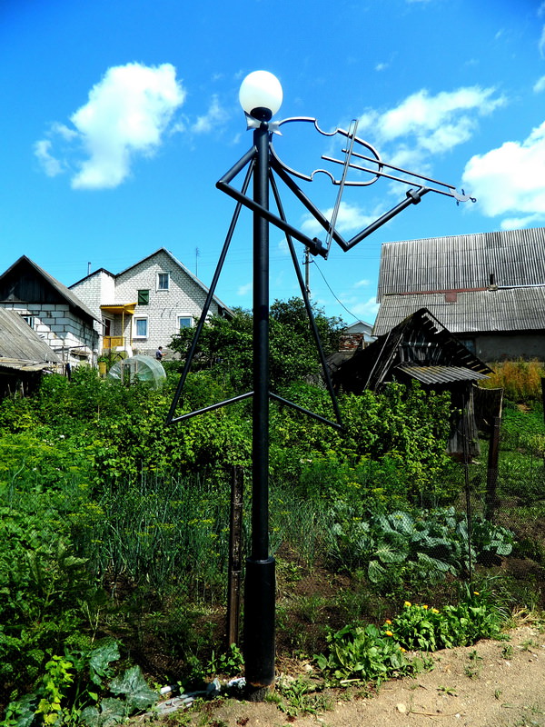 скрипач фонарь кованный